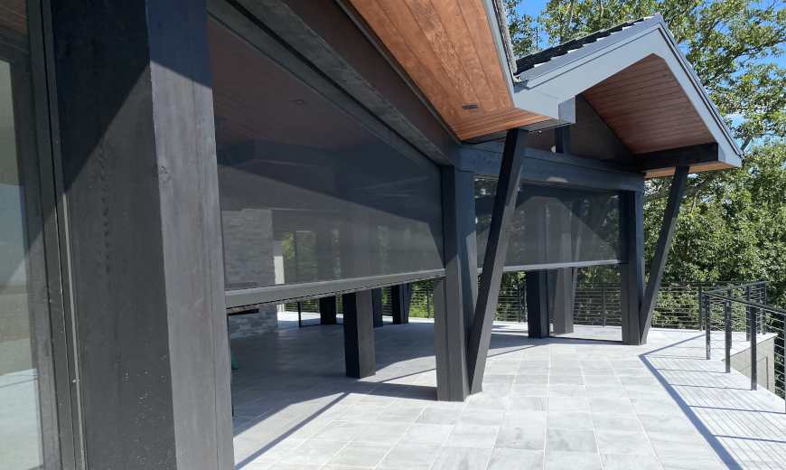 House with retractalbe screens on porch