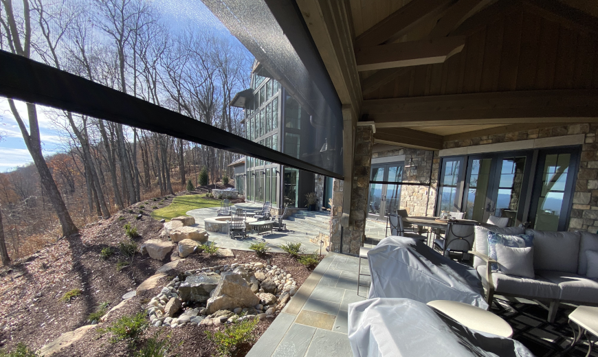 Porch with retractable screens overlooking mountains