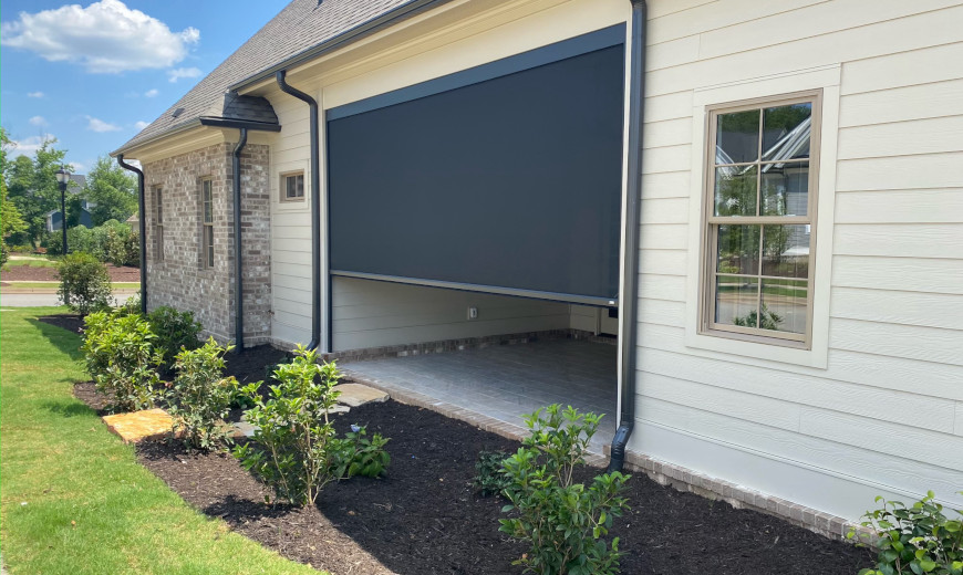 Recessed porch with retractable shades