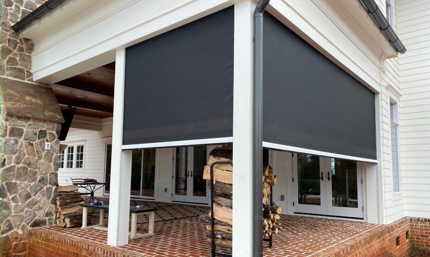 Porch with retractable shades